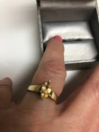Novembers birthstone .93 carat yellow sapphire 14K yellow gold ring.