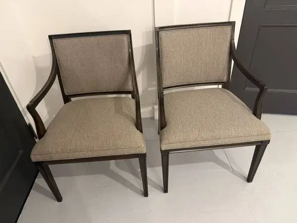 two upholstered  mid century traditional arm chairs