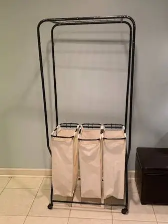 rolling clothing rack with baskets