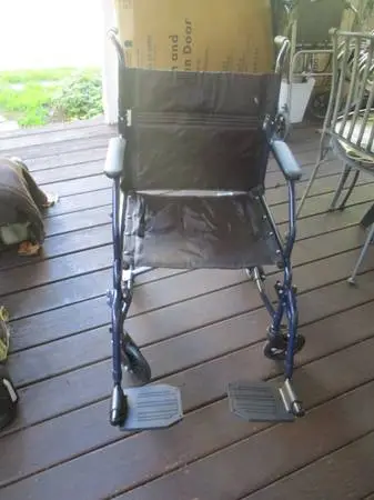 TRANSPORT CHAIR BY CAREX. AS NEW