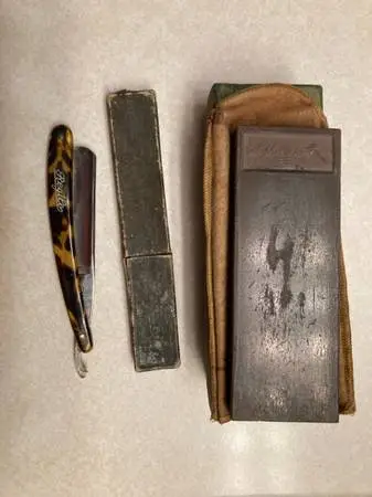 Old straight razor & whetstone