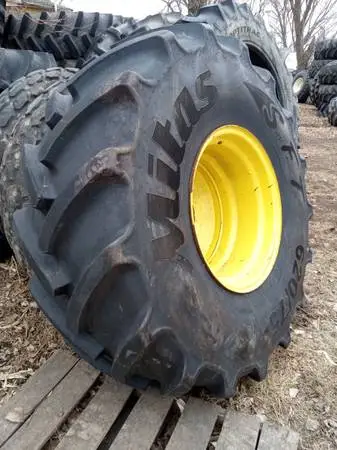 620/75R26 Mitas radial tire on JD 8-bolt rim- like new