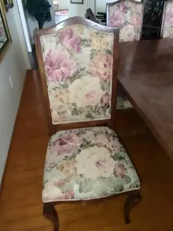 Eight 8 wooden dining chairs.with upholstered seats and backs
