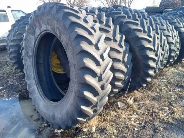 Firestone, Titan, & Goodyear 20.8R42 radial tractor tires
