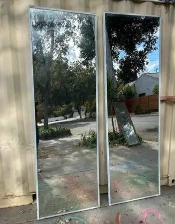 Pair of sliding white aluminum, true mirrored (not plastic) closet doo