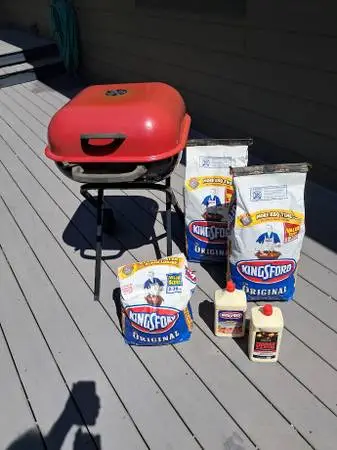 a walk-a-bout Charcoal BBQ with briquettes