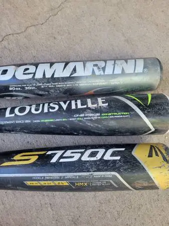 Youth baseball bats and Bruce Bolt batting gloves