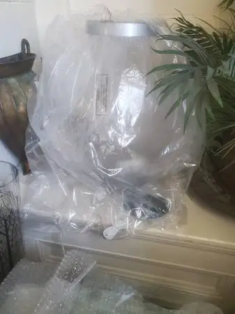 Great gift Very large globe shaped fish tank. Never used.