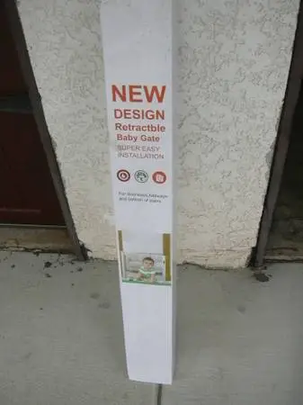 Retractable baby gate like new