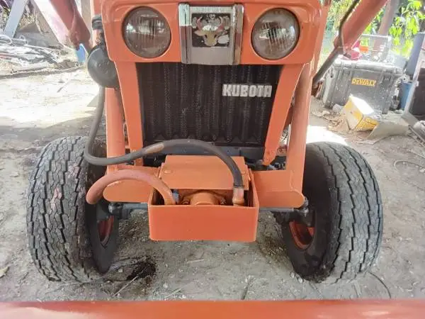 KUBOTA B1700 WITH LOADER AND MOWER,RUNS BUT NEEDS WORK