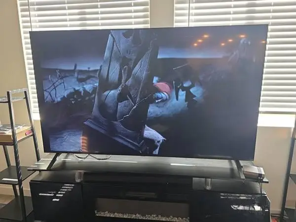 75” Panasonic 4K Smart TV + Fireplace TV Stand/Heater – $625