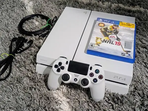 Sony PlayStation 4 Console + Games and Dual Shock Controller!