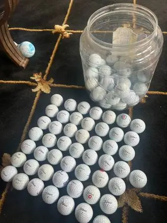 88 Titleist Golf balls, assorted brand name balls