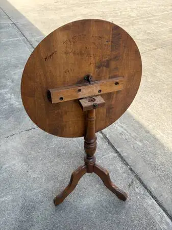 Three legged folding side table