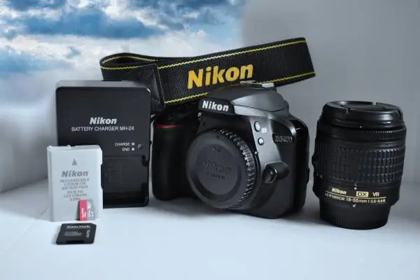 Nikon D3400 DSLR with 18-55mm Lens.  Shutter ONLY 7,578.