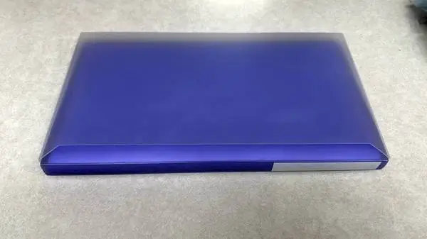 Purple photo album with slide in cover and labels