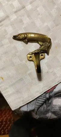 Vintage brass muskie coat hook