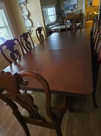All wood 8 chair dining room set with China hutch
