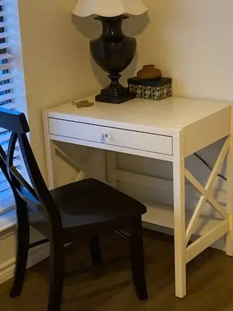Desk with 2 chairs.