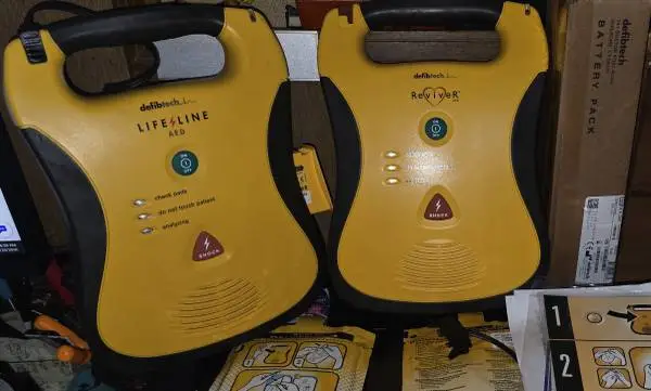 2 Defibtech AED units,1 new battery, new electrode pad set