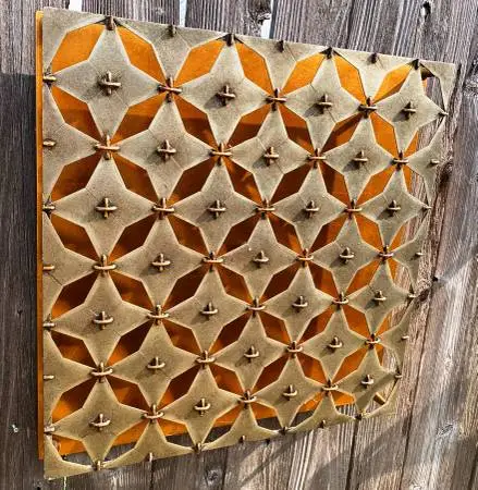 Wall mount metal art work by Lam Lee Group