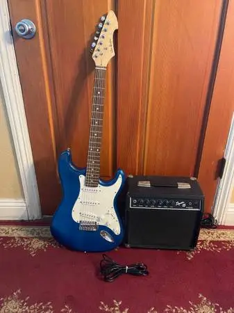 Guitar and speaker