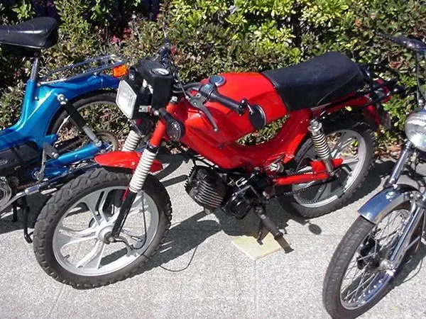 Barter / Trade a RED Tomos Moped, runs and has the rare kick starter,