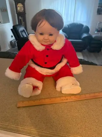 Porcelain Boy Doll with Santa Suit