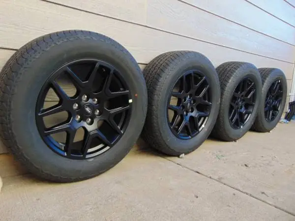 4 Used 20X8.5 Black OEM Ford F150 Rims & 275 60 20 Hankook A/T Tires