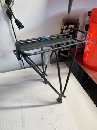 Bike rack to carry touring pantiers/bags. Quality.