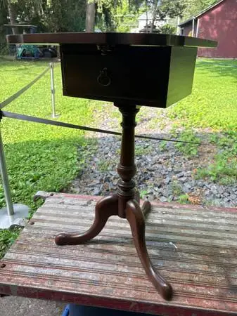 Wooden tilt top cabinet table