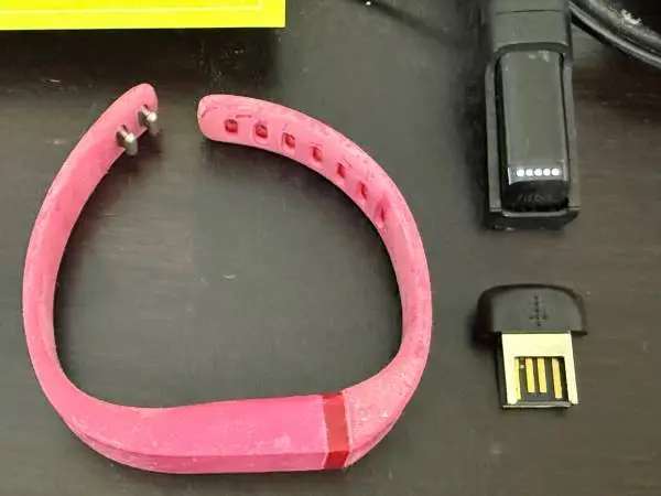 Fitbit Flex FB401, including charger, band, and dongle