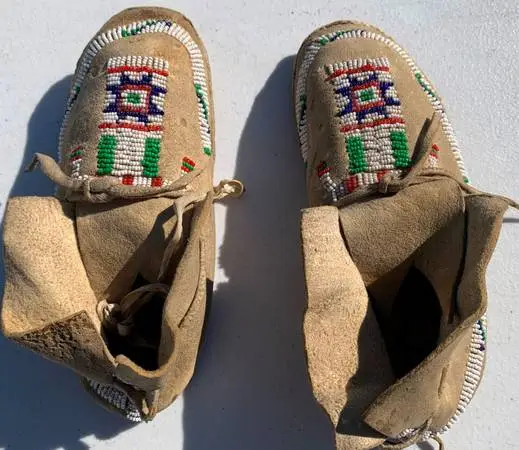A pair of Antigue Indian hand made baby shoes with bead