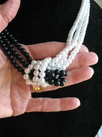 Black and white multi strand faux pearl necklace