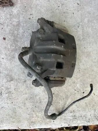 2005 Nissan Frontier Front driver side Brake Caliper