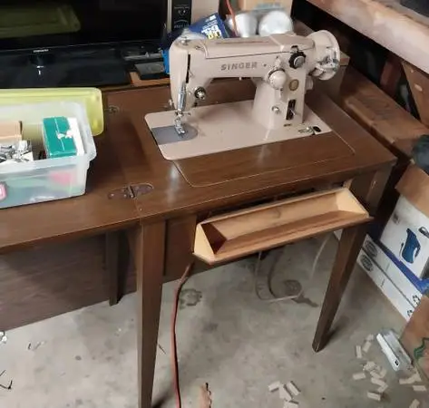 Singer sewing machine with attachments
