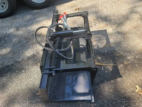 Mini skid steer grapple
