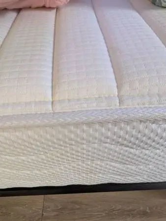 Twin bed frame and mattress with linen