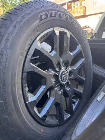 265/60/20 2024 Toyota Tundra OEM Black Factory Wheels