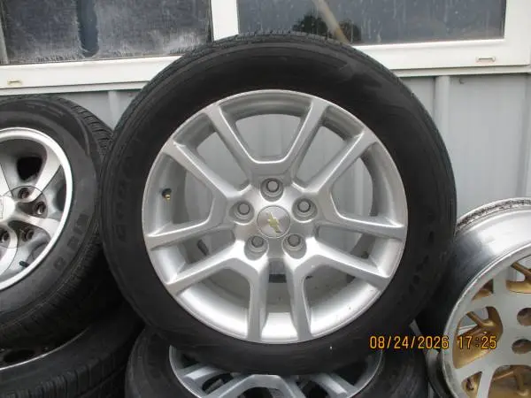 Set of Rims and Tires 225 55 R17 on Chevy Rims