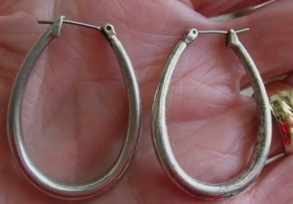 Silver Elongated Hoop Earrings. 1.5  long. Might be Sterling