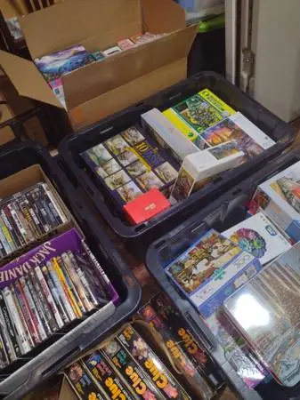 100s of Puzzles and DVDs sale (.50 cents-$3)