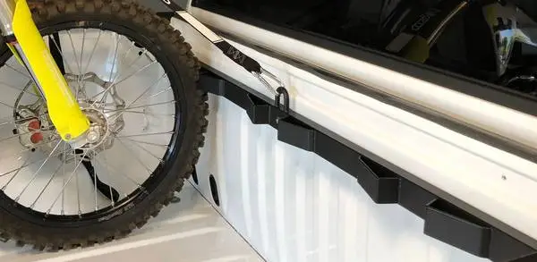 Truck bed buddy tie off motorcycles