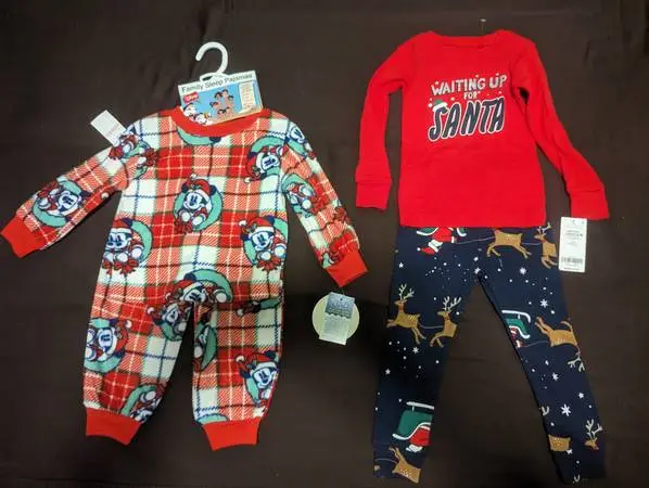 2 sets of New still with tags holiday pajamas sets, size 2T