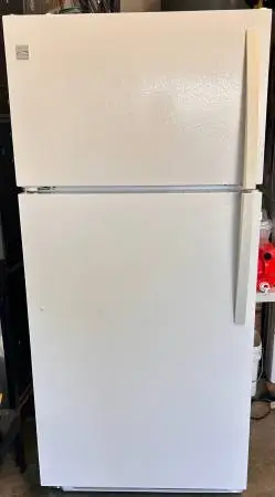 White Kenmore top freezer refrigerator