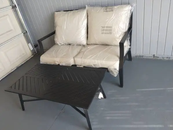 Outdoor patio sofa with coffee table