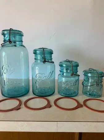 Antique Set of Blue Glass Ball Fruit Jars With Wire Bail and glass Top