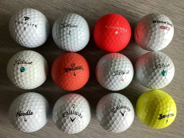 12 Brand Name Golf Balls $10 (As Pictured)