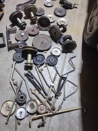 Lawnmower pullies and controller arms used