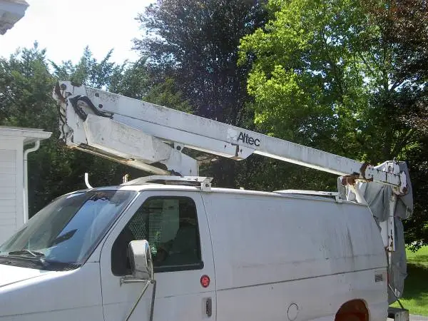 Wanted Ford or Chevy Van with bucket lift/boom from the 1990s